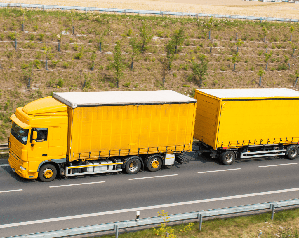 A yellow truck on the road